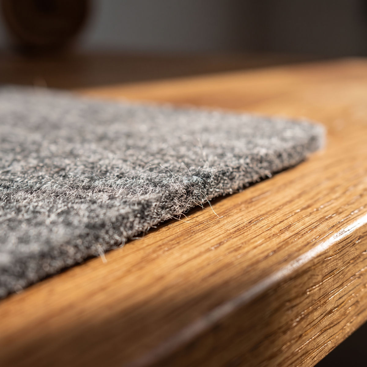 Close up of the wool felt texture and cut edge of the Thoren desk mat